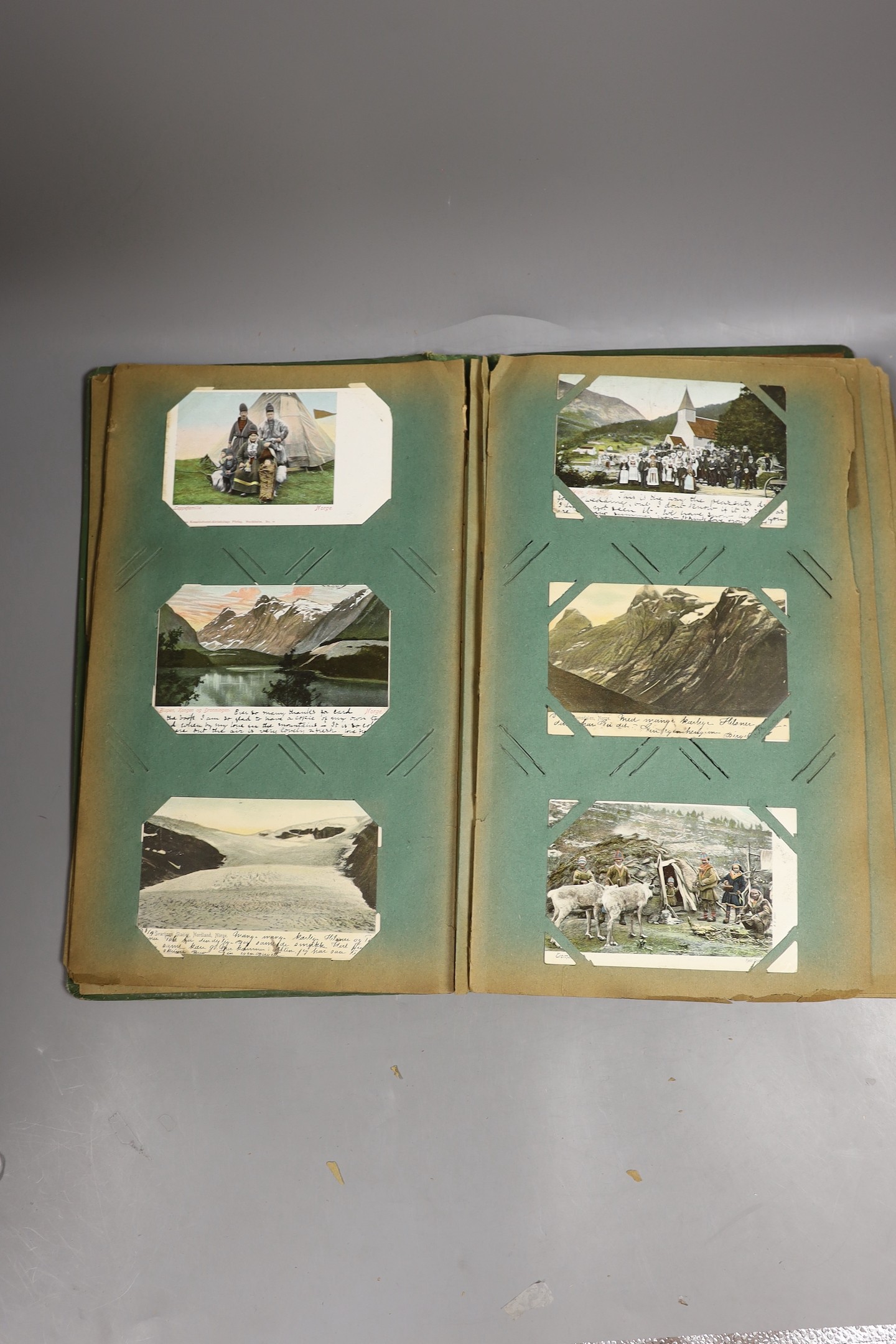 Nine albums of Edwardian and later topographical, portrait etc. postcard albums